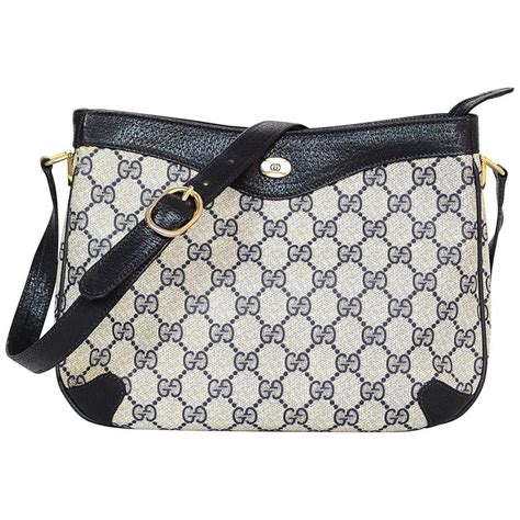 gucci navy monogram crossbody bag|Gucci embossed crossbody bag.